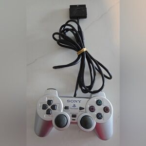 Sony PlayStation 2 Dual Shock Analog Controllers - One Sony And One Unbranded